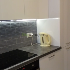 Nowoczesna kawalerka 32 m² z osobną kuchnią, balkonem i garażem – Warszawa, Osiedle Wilno